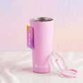 Pink tumbler with clear lid on a light pink background