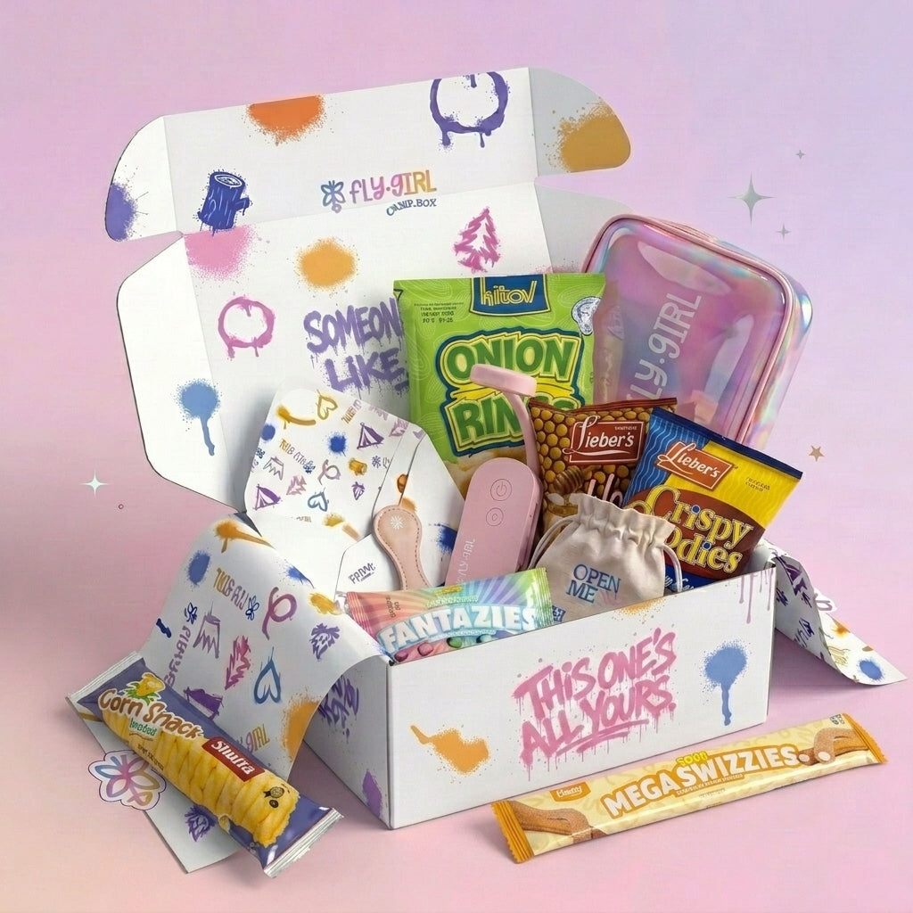 Open box with various snacks and stationery items on a pink background