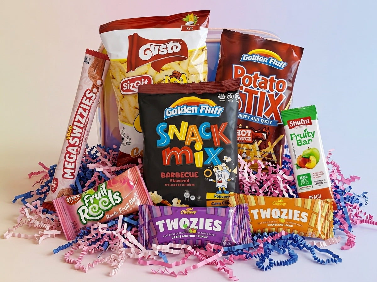 Assorted snack items including chips, candy bars, and a snack mix on a white background.