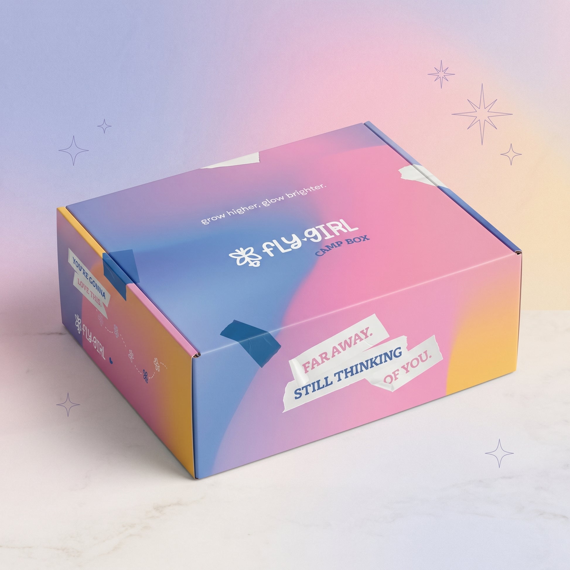 Colorful box with 'Fly Girl' branding on a gradient background