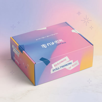 Colorful box with 'Fly Girl' branding on a gradient background